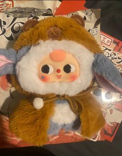 Plush doll Baby Three warrior brown - open box