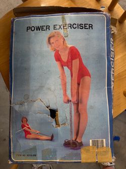Vintage Spring Action Rower Exerciser Rowing Pull Up Machine With Original Box. Box is damaged