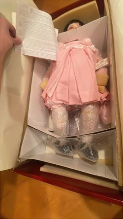 A vintage Fayzah Spanos Baby Love porcelain Doll
