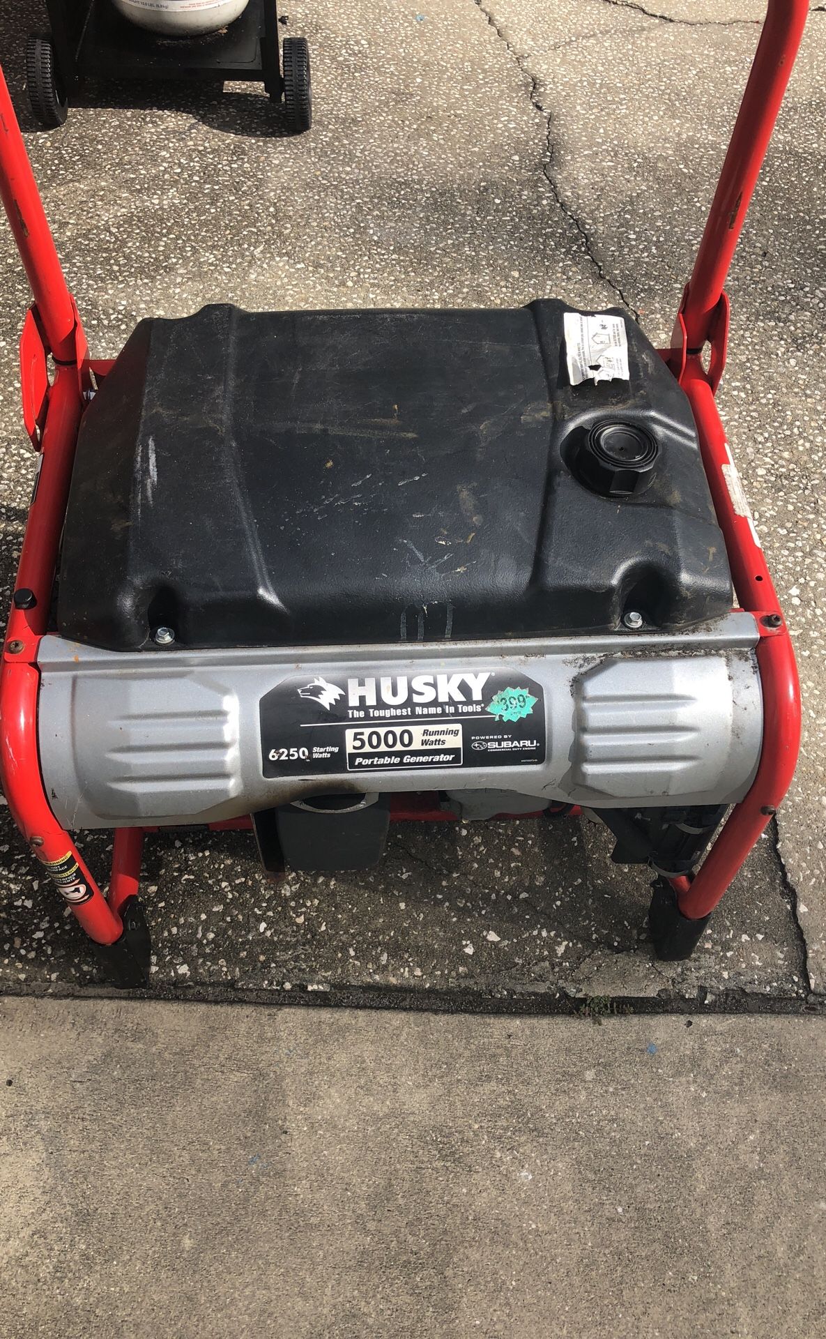 how many horsepower does a husky 5000 watt generator have