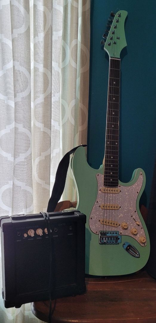 Guitar With Amp $100