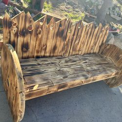Rustic wire-spool bench, burn-finished reclaimed wooden