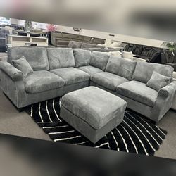 Dark gray corduroy sectional wiith ottoman