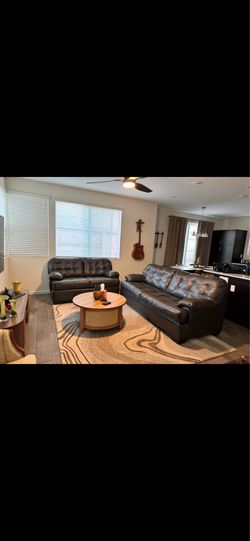 Dark gray leather sofa & loveseat