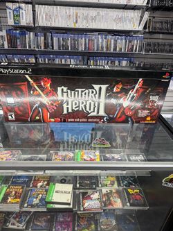 Guitar Hero 2 with Guitar PS2 $145 Gamehogs 11am-7pm