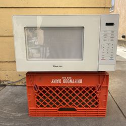 Magic Chef 1.1 cu. ft. Countertop Microwave, 1000 Watts, Light is out, Everything else works excellent. 