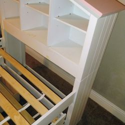 A Child  Twin Sizes Bed With  Lots Of Storage, Plus Second Bed Underneath. 