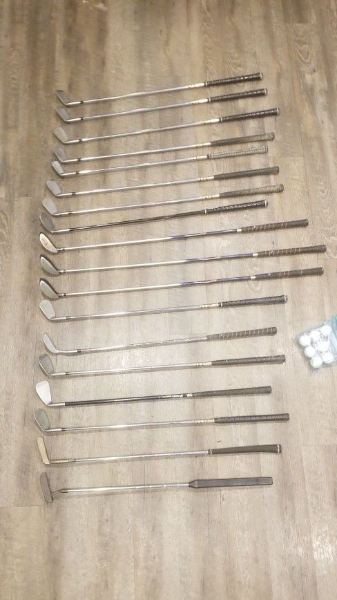 18 Golf Clubs, Bag, & Misc
.