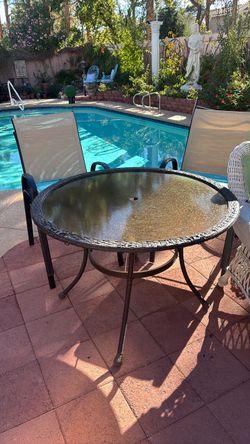 42” table with 4 chairs plus cushions