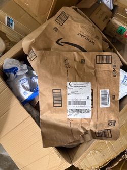 27 Amazon packages, brand new and unopened, $15.