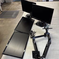 4 LG Screens With Power Cords And Desk Stand