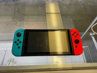 Nintendo switch w/ charger. HAS STICK DRIFT