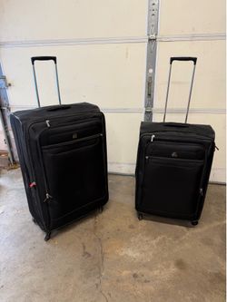 DELSEY brand suitcase (med/large)