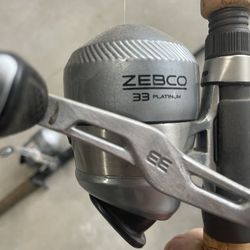 Two Medium  ActionFishing Poles With Reels