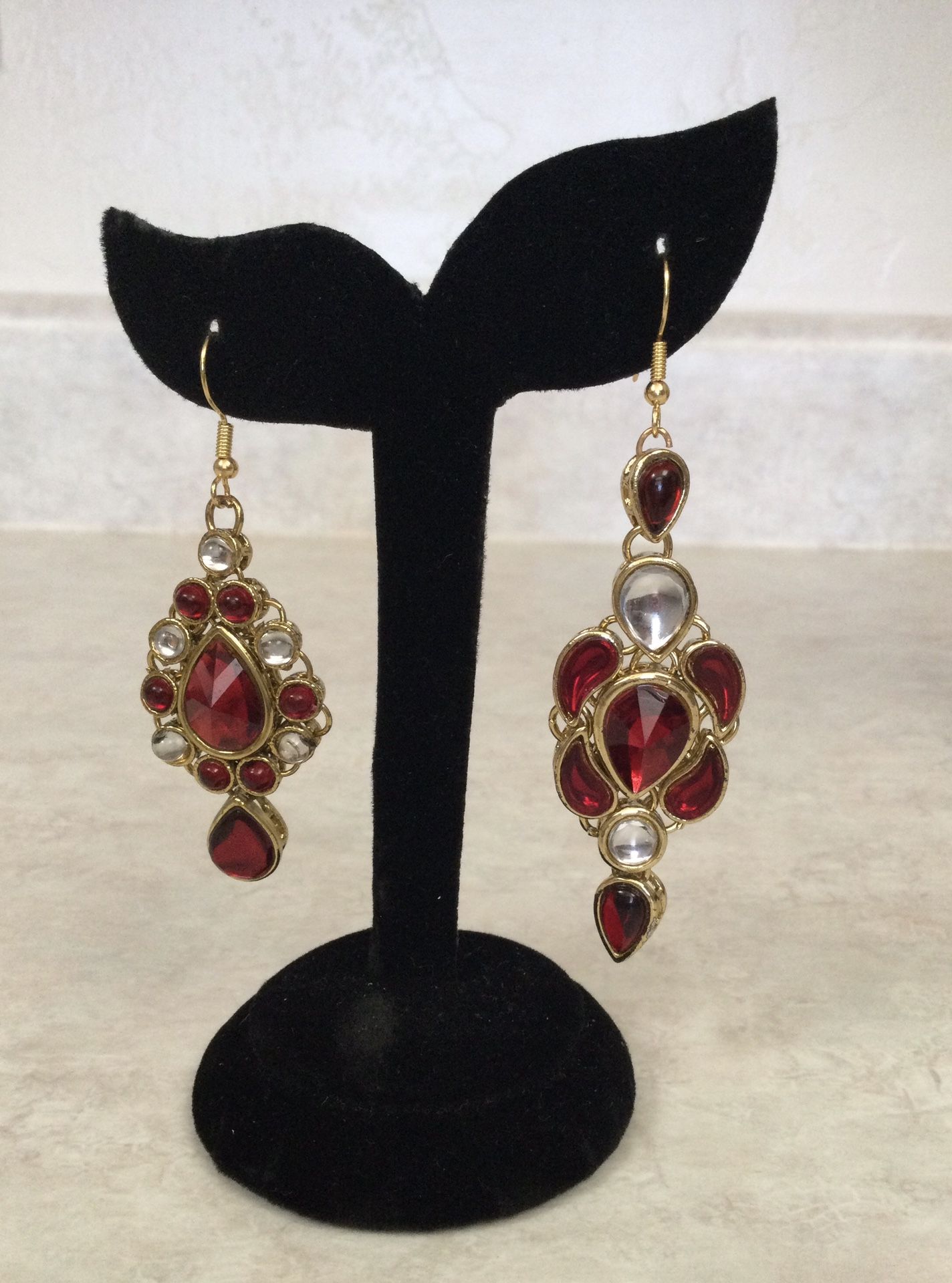 Asymmetrical Earrings (Asymmetrical is different sizes or shapes, still part of a coordinated design concept.)