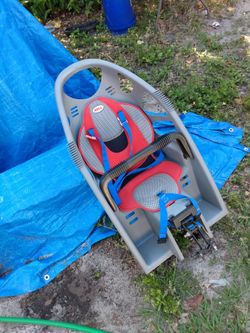 Child Seat For Bicycle Made By The Bell Manufacturing Company Is It Has Safety Straps A Front Guard For The Infant And A Light In The Back So It Can B