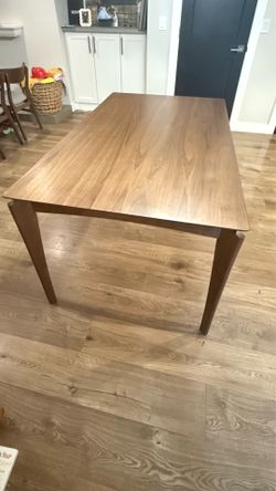 Wooden table that can seat six