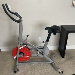 Sunny Health & Fitness Indoor Cycling Resistance Exercise Bike w/Optional Dumbbell Holder & Connected Fitness