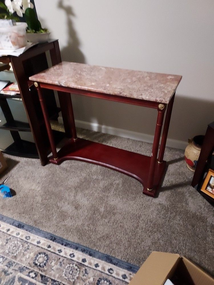 MARBLE  CONDOLE TABLE 36 INCHES WIDE AND 30 INCHES HEIGHT AND. 15 DEPTH.$40.00