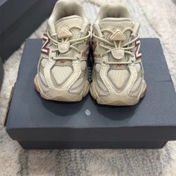 pair of New Balance 9060 "Bone Sparrow" toddler sneakers