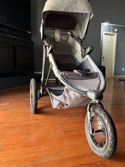 Gray Three-Wheel Jogging Stroller