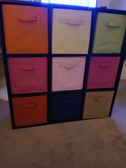 Cubby, like new. $50.00 with 9 canvas bins
