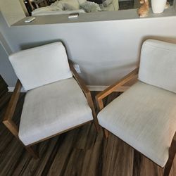 Two Studio McGee cane back accent chairs