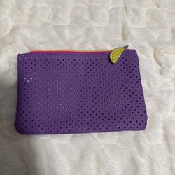 Purple purse with lemon zipper