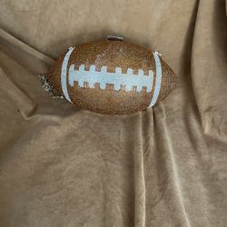 Gold and silver football clutch bag with a chain strap