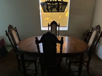 Large solid wood table also come with extra leaf and cover solid wood