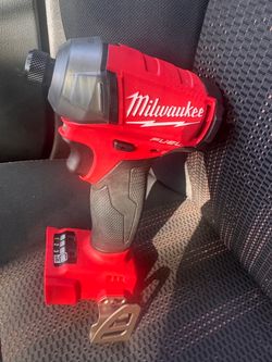 Milwaukee surge fuel brushless 1/4 impact driver tool only new