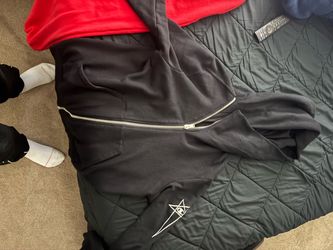Rick owns zip up Jacket
