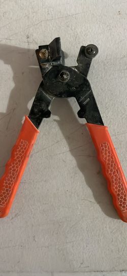 mosaic tile nipper, primarily used for cutting and shaping glass or ceramic tiles for mosaic work.