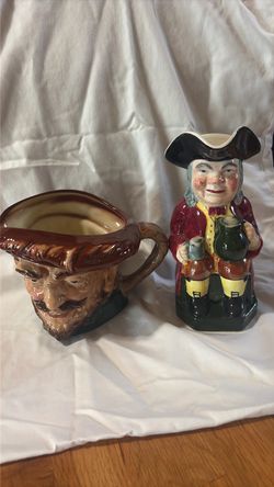 Pair of Toby Pitchers