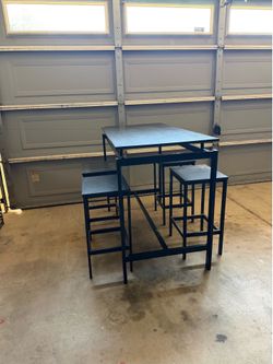Dining table and four chairs