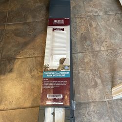 White cordless 2 1/2 inch premium Faux Wood Blind Brand new in box never opened