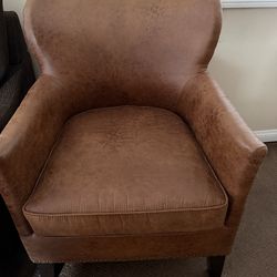 2  Pottery barn Brown leather chairs