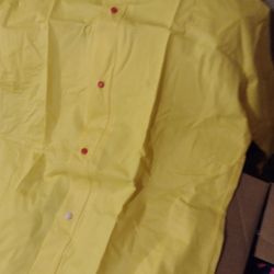 Rain Coats And Boots Couple Of Pairs