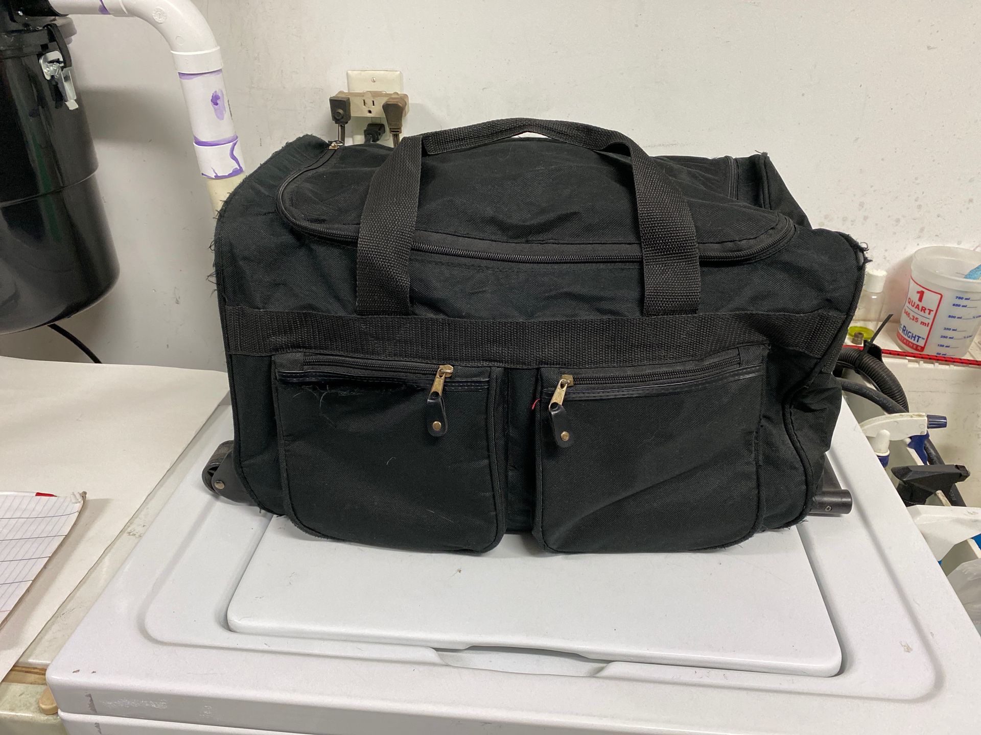 Free Rolling Duffle Bag with Telescope Handle