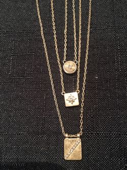 THREE GOLD PLATED NECKLACES FROM NORDSTROMS with TINY DIAMONDS IN EACH.