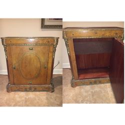 Vintage/antique cabinet with armaludes