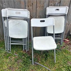 8 resin white folding chairs