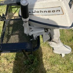 65 six horse Johnson two-stroke outboard