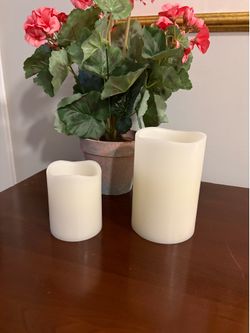 Battery operated candles- brand new- 2 count