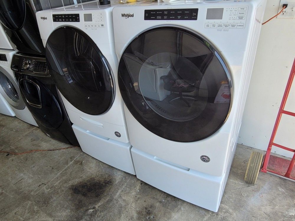 Like New Whirlpool Front Loading Washer And Gas Dryer Set With Pedestals