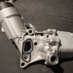 Oil filter housing/cooler for Chevy and Buick models