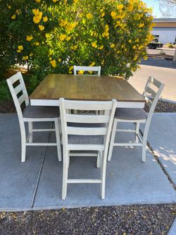 Ashley counter height 5 piece dining set ( can deliver for $10 )