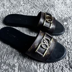 Louis Vuitton Lock It Slides