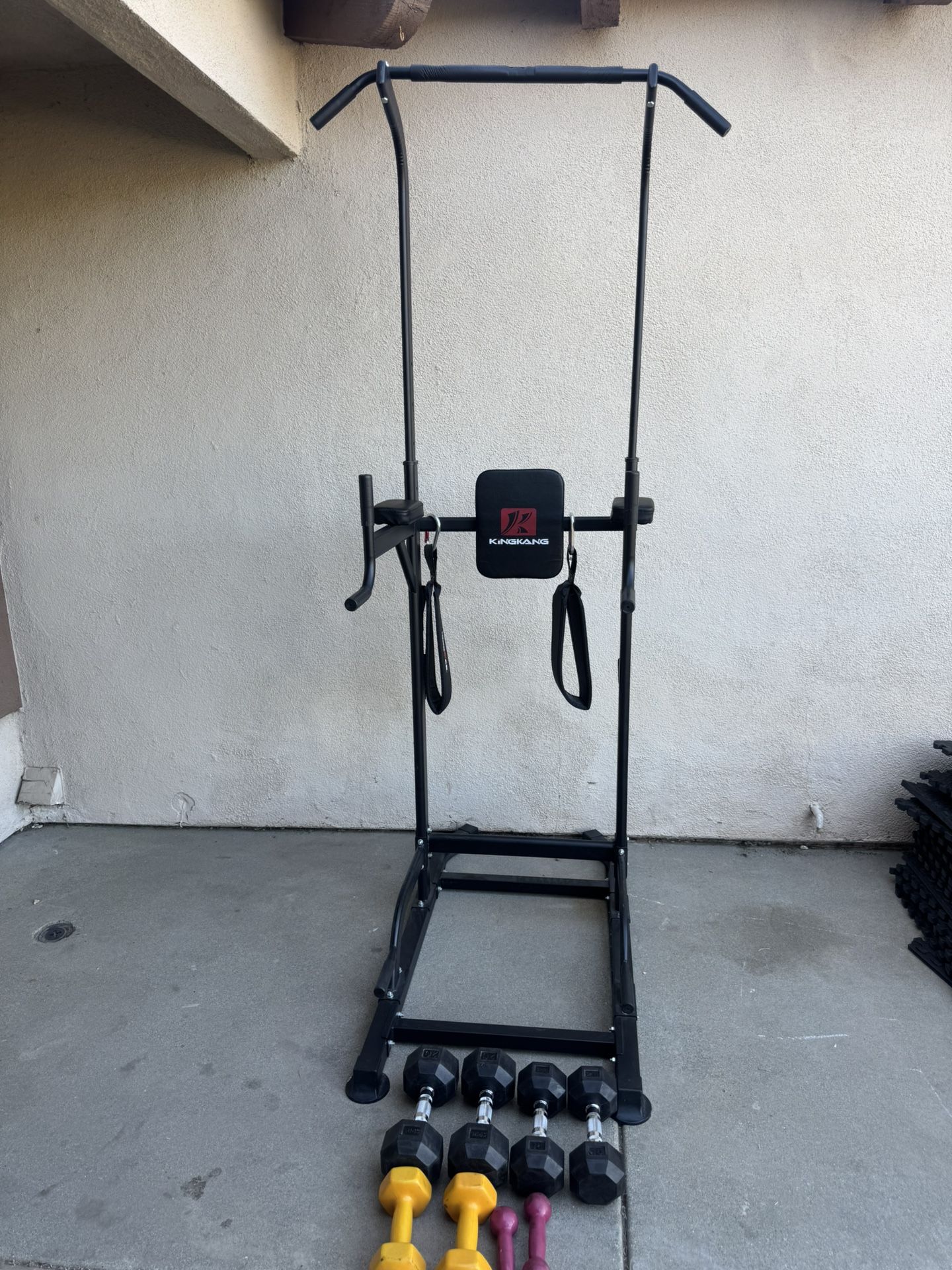 Power tower/dip station and 20,15,10 pairs of dumbbells weights