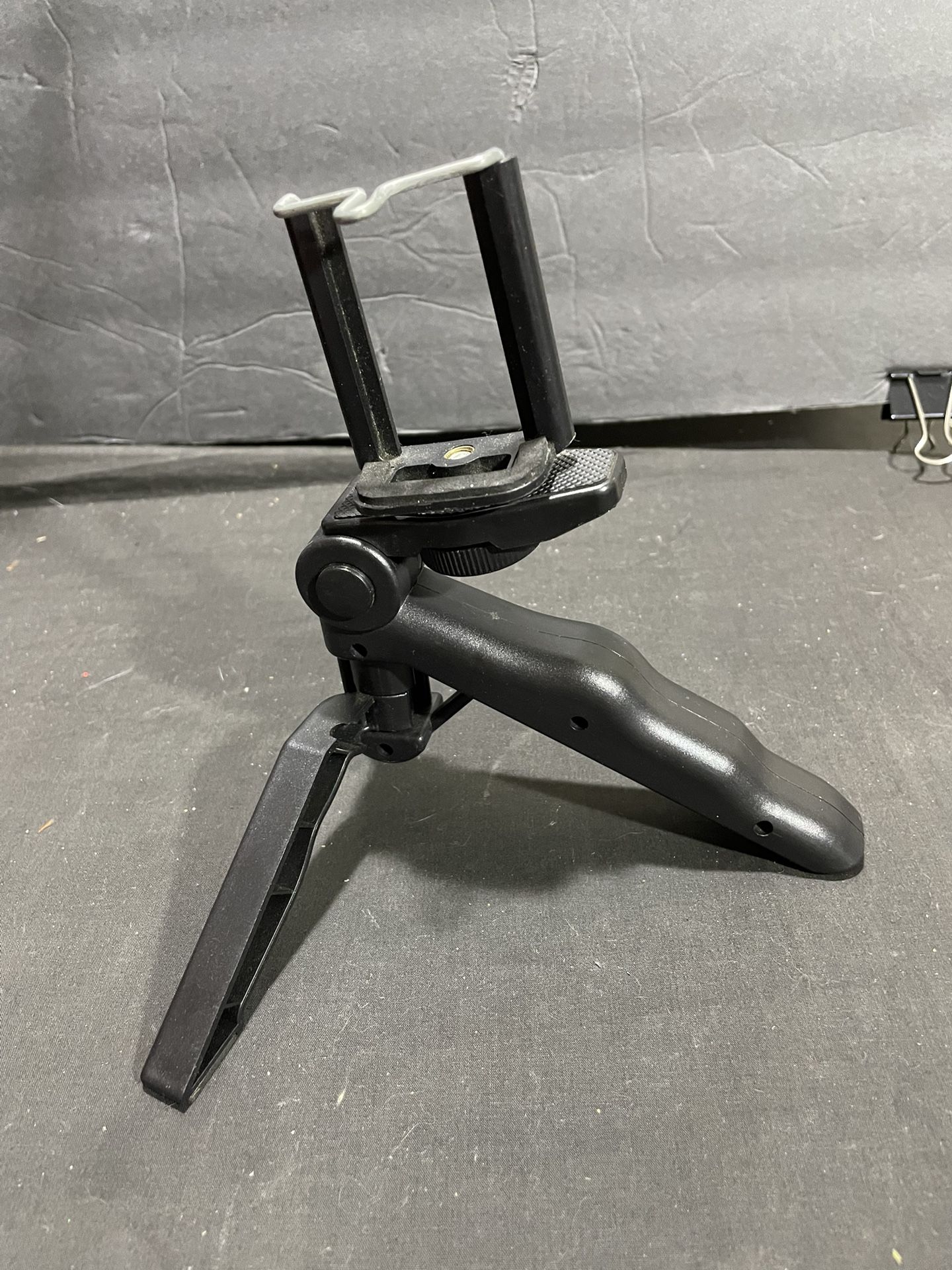 Small portable tripod with camera holder